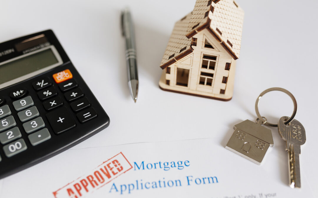 mortgage contract and house figurine